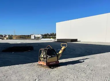 Road base import and preparation at a commercial depot